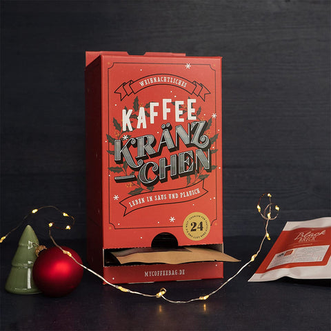 2025 Kaffi-Adventskalender mat 24 eenzelen Drëpssäckchen a 12 verschiddene Varietéiten